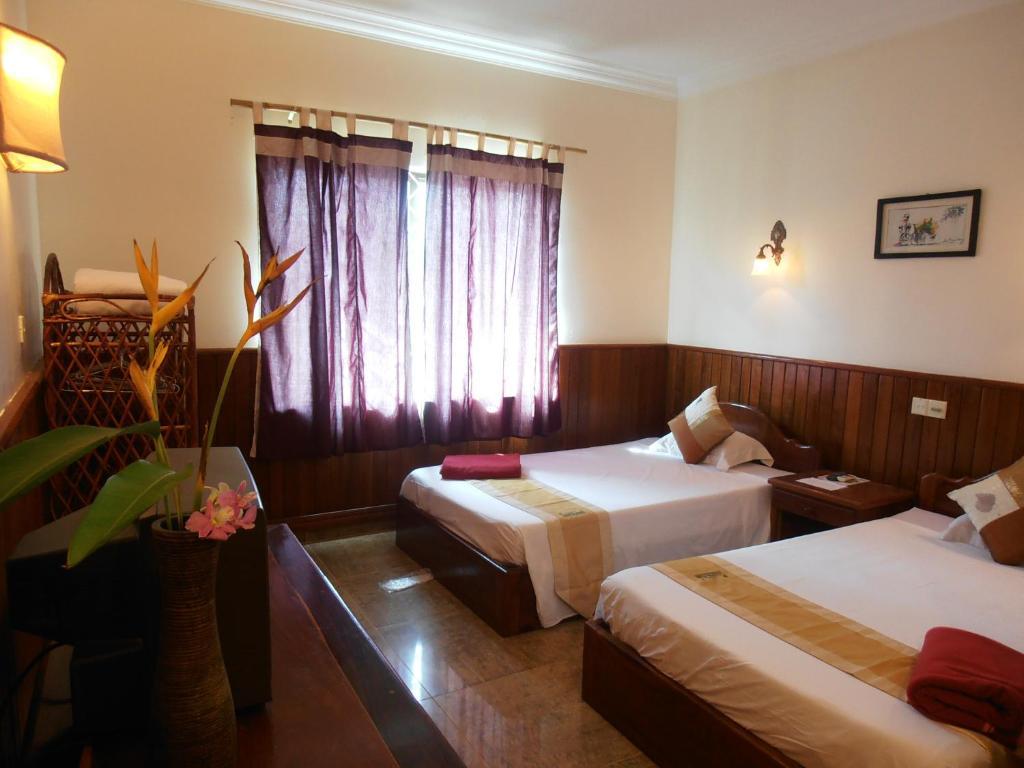 Firefly Guesthouse - The Berlin Angkor Siem Reap Chambre photo
