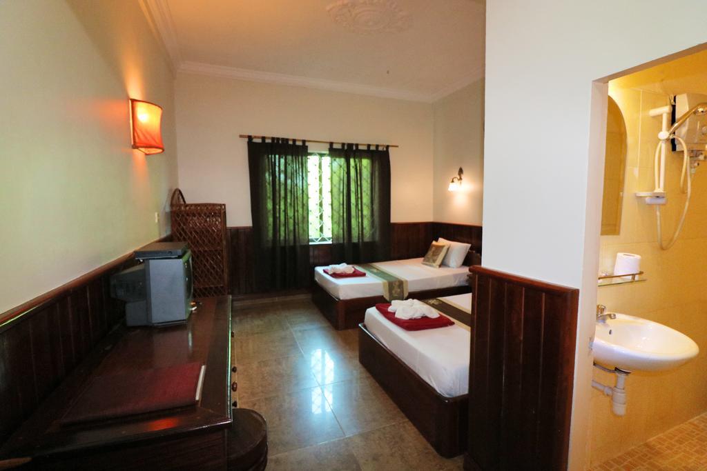 Firefly Guesthouse - The Berlin Angkor Siem Reap Chambre photo